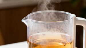 BPA-free plastic kettle with steam rising.